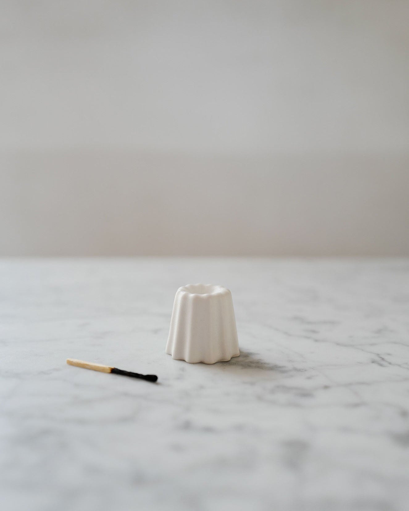 Porcelain candle holder